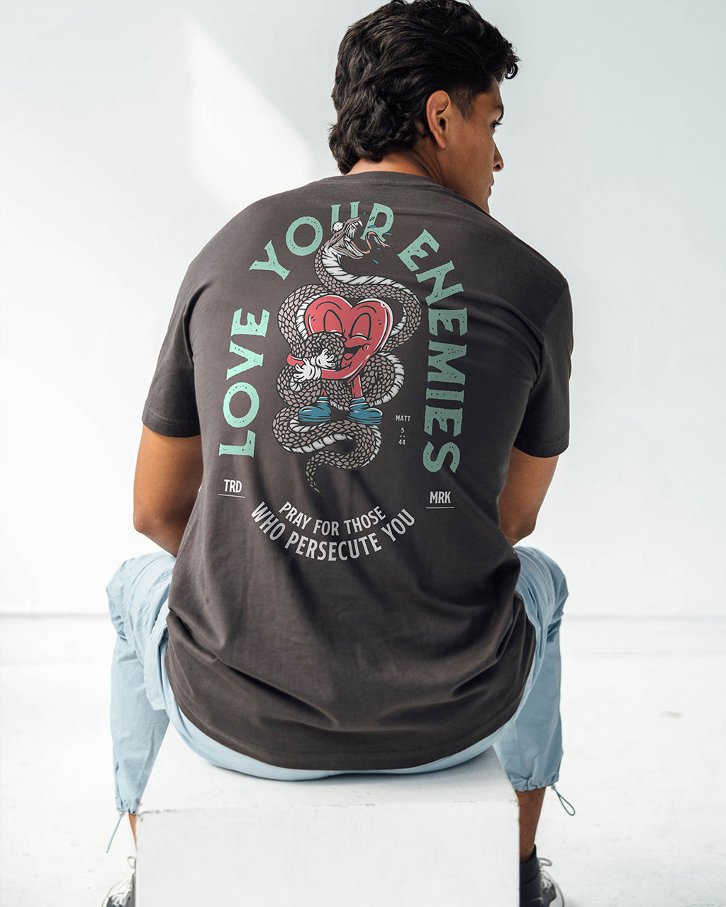 Love Your Enemies 2.0 Tee – In God We Must